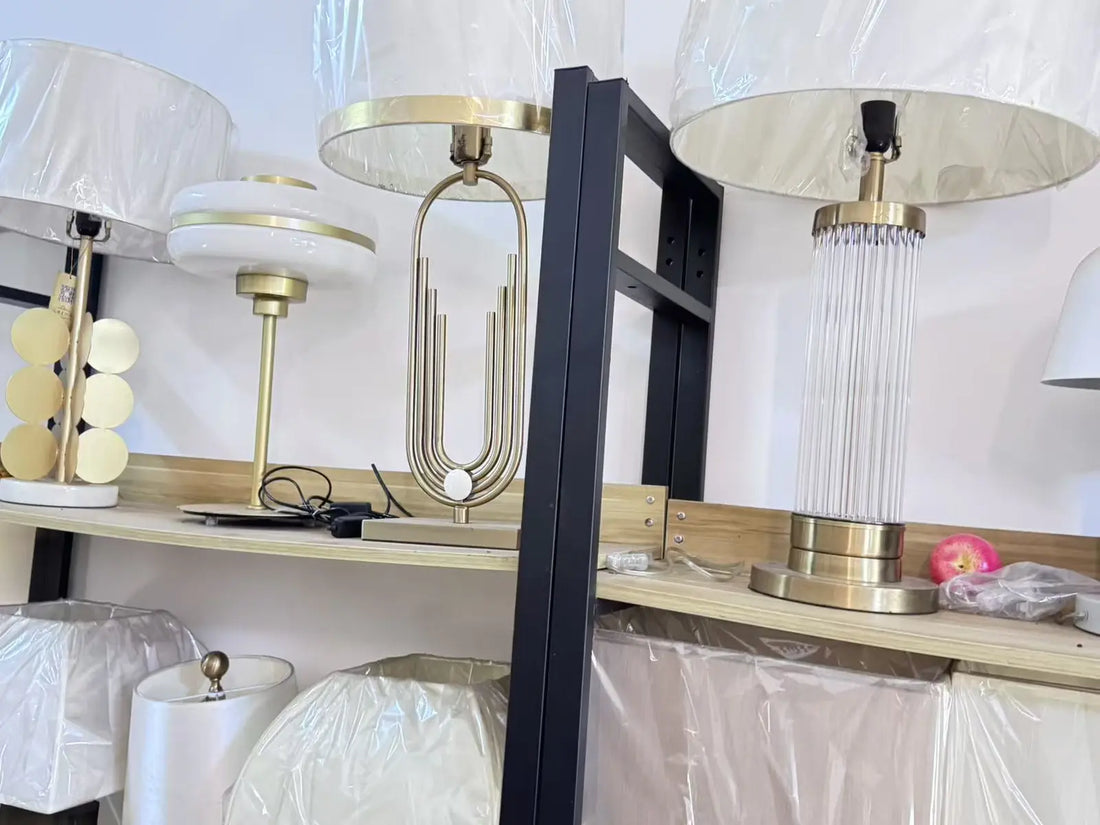 Real brass, glass and fabric-shade table-lamp samples in Guzhen