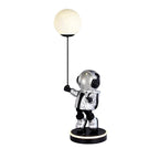 Resin Astronaut and Planet Lamp by Tavilume - resin medium table lamp, view 6